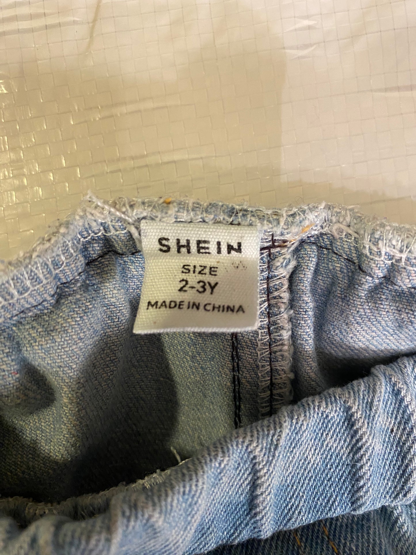 Distressed Light Wash Denim Pants – Cartoon Patch Accents