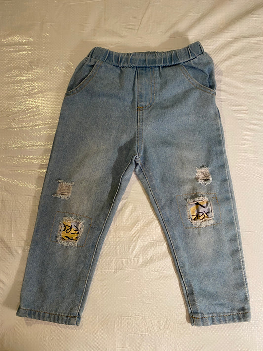 Distressed Light Wash Denim Pants – Cartoon Patch Accents